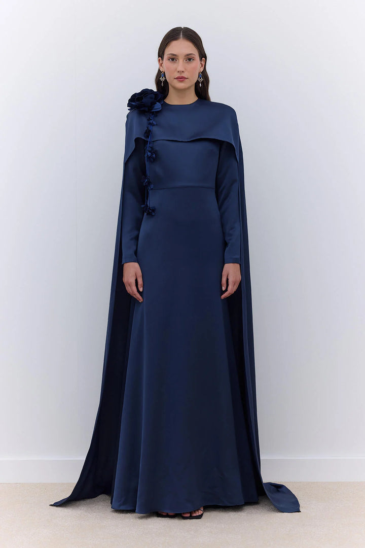 Elegant Cape Dress with Flower Detail