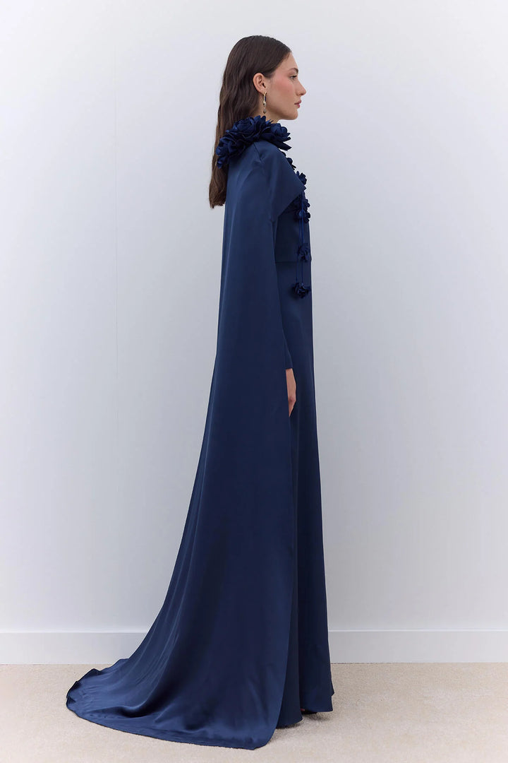 Elegant Cape Dress with Flower Detail