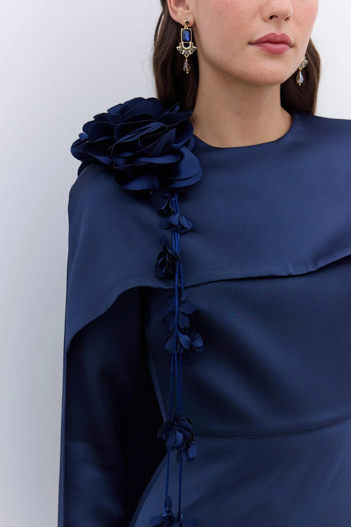 Elegant Cape Dress with Flower Detail